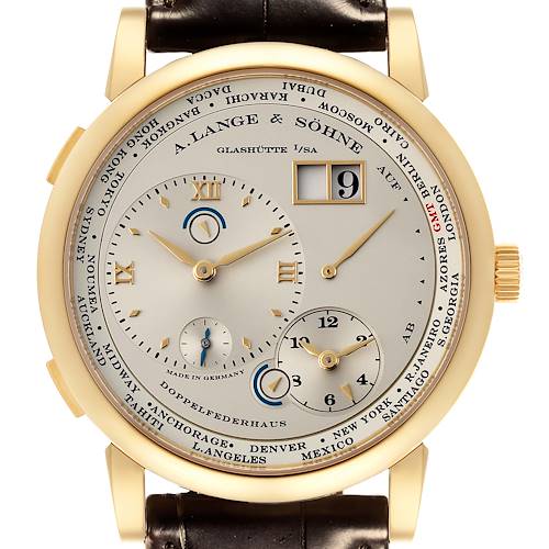 The A. Lange & Sohne Lange 1 116.021 Men's Yellow Gold Silver Dial watch is shown from a front angle displaying its multi-dial face and world cities.