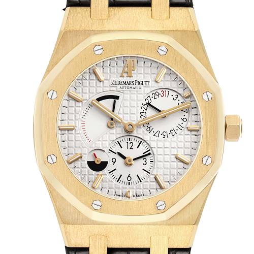 The image shows a frontal view of the Audemars Piguet Royal Oak 26120BA Men's Yellow Gold Silver Dial watch, highlighting its dial, bezel, and crown.