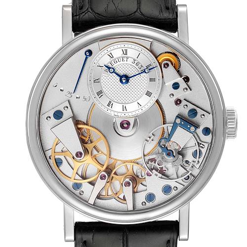 The Breguet Tradition 7027BB/11/9V6 Men's White Gold Transparent Dial 7027BB/11/9V6 Men's White Gold Transparent Dial model watch is shown from a top-down angle, featuring visible gears and intricate mechanics.