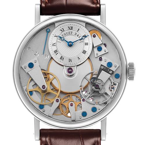 The Breguet Tradition 7027BB/11/9V6 Men's White Gold Transparent Dial 7027BB/11/9V6 Men's White Gold Transparent Dial model is shown from the front, displaying its dial, gears, and intricate mechanical parts.