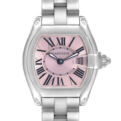 The image shows a frontal view of a Cartier Roadster W62017V3 Women's Stainless Steel Pink Dial watch with a pink dial and metal bracelet.