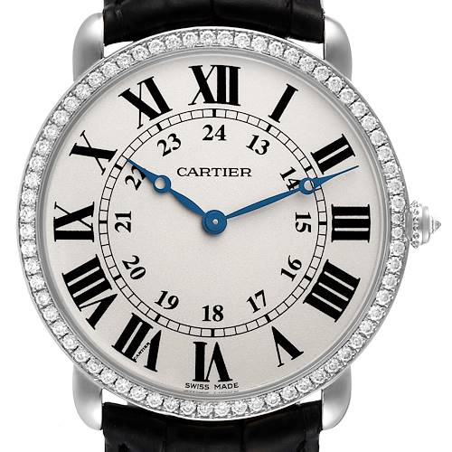 The image shows a close-up of the Cartier Ronde watch face, highlighting the Roman numerals, blue hands, and diamond-set bezel.