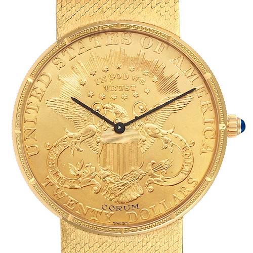 The image shows the face and part of the band of a Corum Coin Watch 1897 Men's Yellow Gold Black Dial 1897 Men's Yellow Gold Black Dial model, highlighting its intricate design.