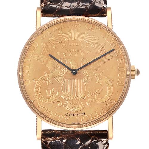 The Corum Coin Watch 4414556 Men's Yellow Gold Champagne Dial 4414556 Men's Yellow Gold Champagne Dial model is shown from a front angle, featuring its detailed coin dial and textured strap.