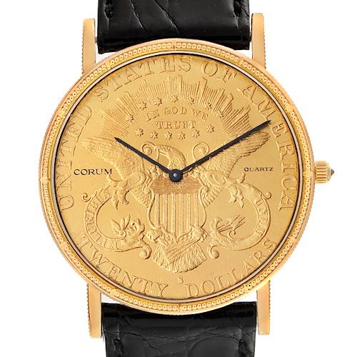 The image shows the face and leather strap attachment of the Corum Coin Watch 1900 Men's Yellow Gold Black Dial 1900 Men's Yellow Gold Black Dial model, featuring a gold coin design.