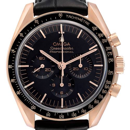The Omega Speedmaster 310.63.42.50.02.001 Men's Rose Gold Black Dial 310.63.42.50.02.001 Men's Rose Gold Black Dial watch is shown from a front angle, highlighting its dial, tachymeter, and chronograph features.