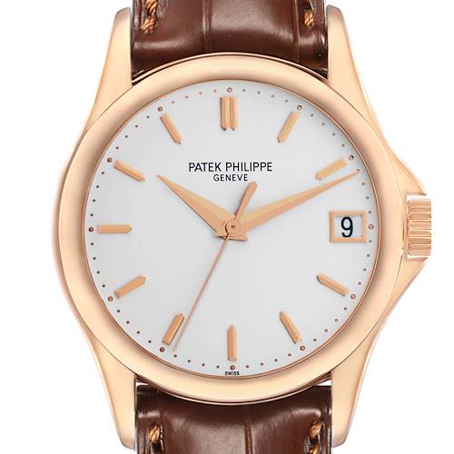 The Patek Philippe Calatrava 5127 Men's Rose Gold Silver Dial watch is shown in a close-up front view, highlighting the dial, hands, date window, and leather strap.