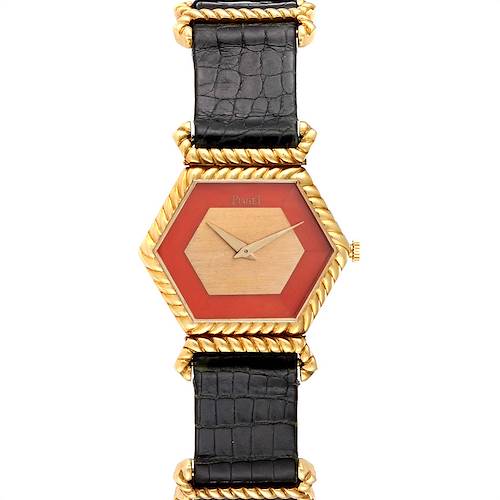 This image shows a front view of the Piaget 9559 Women's Yellow Gold Pink Dial 9559 Women's Yellow Gold Pink Dial 9559 model 18K Yellow Gold Coral Dial Hexagonal Vintage Ladies Watch with its strap.