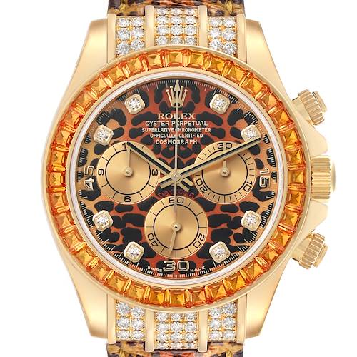 The Rolex Daytona 116598 Men's Yellow Gold Orange Dial watch is shown from the front, highlighting the leopard-patterned dial, gemstone bezel, and diamond markers.
