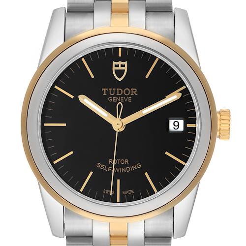 The Tudor Glamour 55003-0007 Men's Steel and Gold (two tone) Black Dial watch is shown from a front angle, highlighting its black dial, gold bezel, hands, and bracelet.