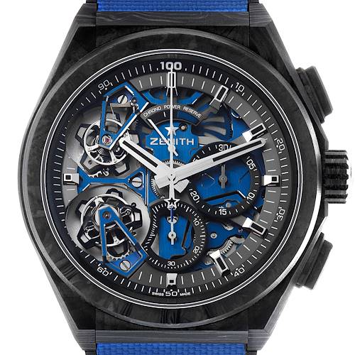 The Zenith Defy 10.9000.9020/79.R918 Men's Titanium Blue Dial watch is shown from a top-down angle, highlighting its intricate open-worked dial and chronograph features.